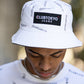 Reversible black/white multi logo bucket hat