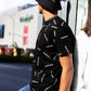 Reversible black/white multi logo bucket hat